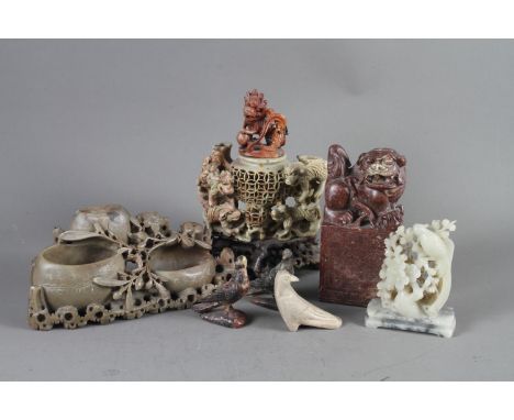 A Chinese carved soapstone seal with Kylin surmount, a carved soapstone brushwash, four other smaller soapstone ornaments, et
