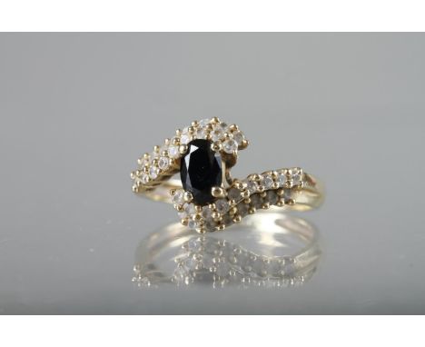 A 14ct gold, diamond and sapphire dress ring, size K, 2.5g 