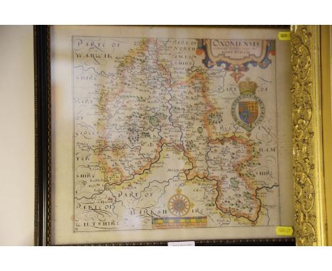 A Saxton map of Oxfordshire, coloured boundaries, 11" x 14", in black and gilt frame, a modern map of Oxford and another of N