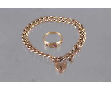 A 9ct curb link bracelet with padlock clasp and an 18ct ruby and diamond set gipsy ring 
