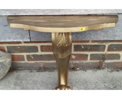 A gold painted shaped front console table, 24" wide, and a white painted two-tier hanging wall shelf, 59" wide 