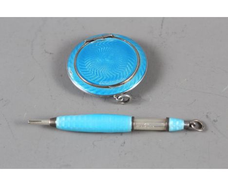 A silver and blue guilloche enamel compact and a similar silver and enamel propelling pencilCondition:Losses to enamel in hig