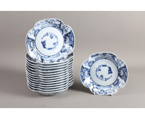A set of fifteen Japanese blue and white porcelain quatrefoil lobed plates, 9" wide 
