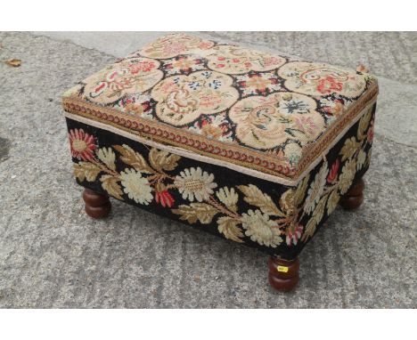 A 19th century box seat ottoman, upholstered in a floral tapestry, on turned supports, 26" wide x 18" deep x 26" high 