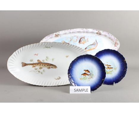 Three Limoges porcelain fish dishes and a set of six Limoges fish decorated plates 
