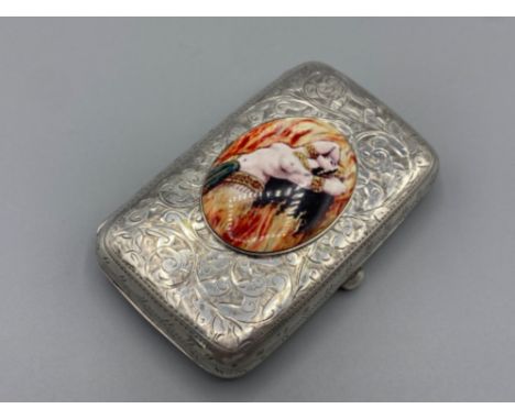 An antique silver case with female nude enamel panel