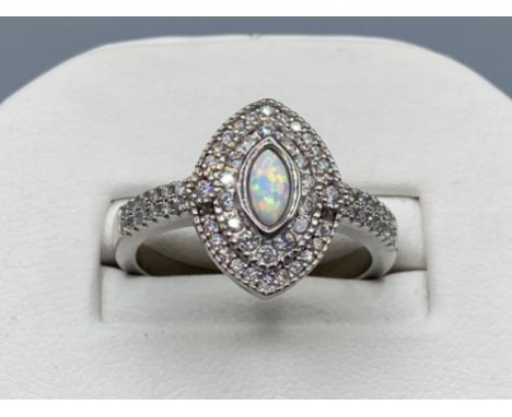 A silver art deco style silver ring set with opal penelin a morquoise shape, 4.3g size S