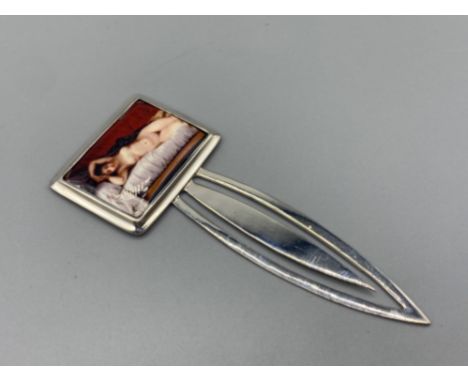 A silver bookmark with enamel plaque depicting a female nude 17.7g