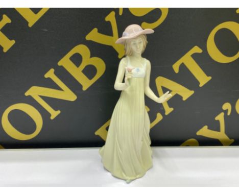 Nao by Lladro figure of an elegant lady with flower