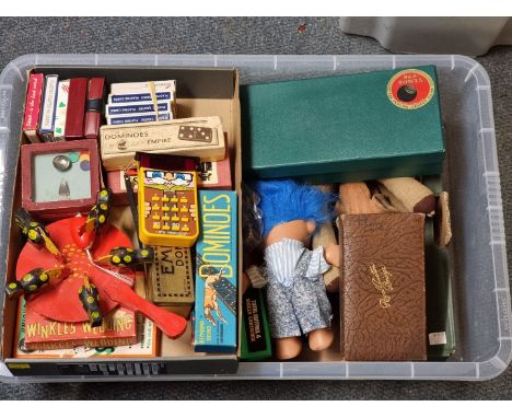 Toys and Pastimes:&nbsp;a group of vintage games, to include Winkles Wedding, a boxed set of carpet bowls, playing card packs