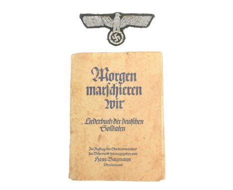 A WWII Second World War Third Reich Nazi German Army Officers uniform chest eagle bullion patch together with a German song b