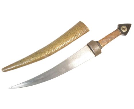 A 19th Century Palestinian Jambiya / Shibriya dagger. Pointed wooden pommel and a grip wrapped in a pressed metal sheet. Doub