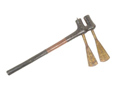 A 19th Century African Chokwe People double headed axe. Iron crescent shaped axe heads coated in Victorian varnish and mounte