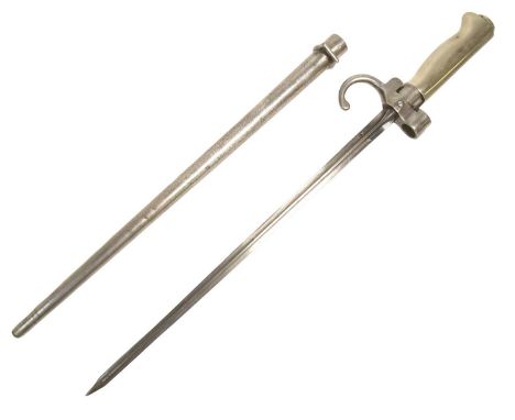 A 19th Century shortened French Lebel Rifle ' Epee ' bayonet. The bayonet having an early nickel hilt, push release button to