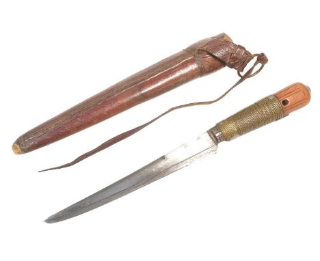 An original North African ( Algeria ) Bou Saada / Saadi Khodmi knife. Carved wooden grip wrapped in brass and iron trade wire