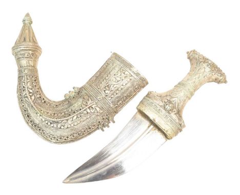 An early 20th Century Middle Eastern / Yemen Khanjar / Jambiya dagger. Characteristic pressed metal hilt etched with crescent