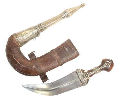 An original South Arabia ( Hadhramaut Yemen ) Gusbi Khanjar Jambiya dagger. Horn hilt with silver filigree mounts, curved bla