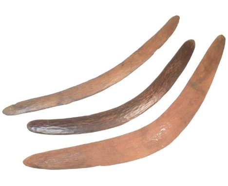  A collection of x3 original Australian Aboriginal stone carved wooden boomerangs. The largest measuring approx 69cm.