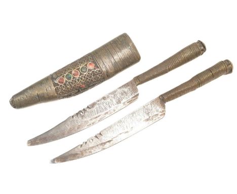 A pair of 19th Century North Africa Algerian Kayble People razor knives. Each knife having wooden grips with fine wire bandin