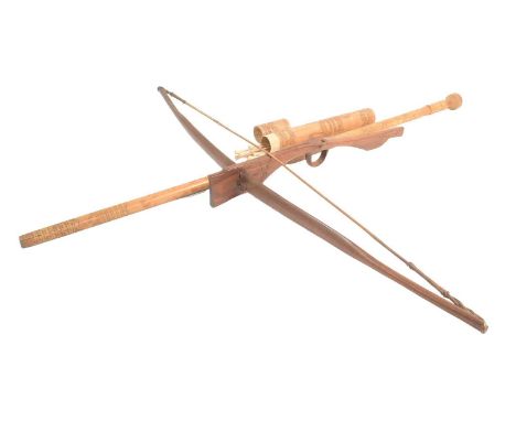 A vintage South East Asian / Malayan bamboo made blow pipe with quiver together with a South Vietnamese Viet Cong cross bow. 
