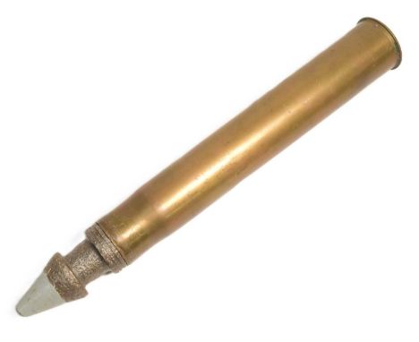 A WWII Second World War Russian 45mm Light Anti Tank INERT ammunition shell round with assorted markings on the base. Measure