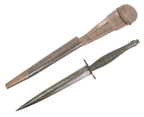 A WWII Second World War British FS Fairbairn Sykes 2nd Pattern Commando dagger. Ribbed and beaded grip with a mould stamp ' 1