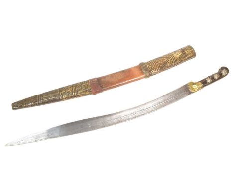 A 19th Century Ottoman Empire Turkish Yataghan sword having a horn grip with applied silver rosettes and a large recurved bla