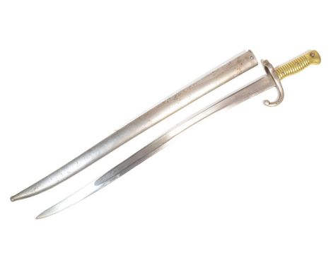 A 19th Century French 1866 pattern ' Chassepot ' rifle sword bayonet. The bayonet having ribbed brass hilt, muzzle ring and f