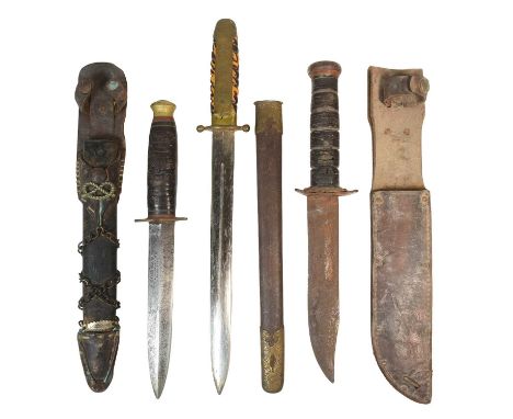 A collection of assorted knives and dagger comprising WWII Second World War period US United States Marines Ka-Bar style bowi