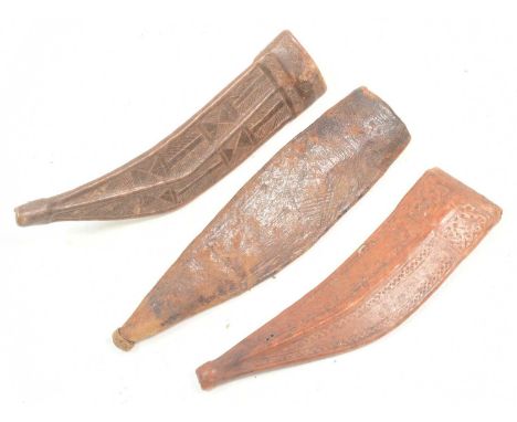 A collection of x3 East African ( Ethiopia ) Afar / Danakil People tooled leather scabbards for the Jile / Gile dagger. Each 