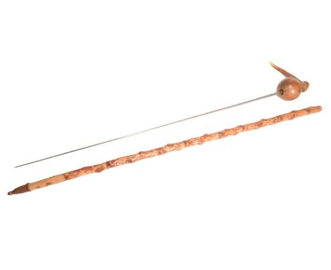 A vintage South African Zulu Knobkerrie converted into a sword stick with a crooked antler handle and a diamond section blade