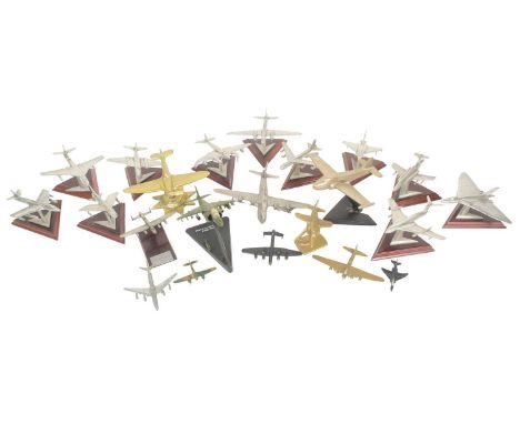 A collection of cast metal, brass and other desktop model aircrafts to include First and Second World War Spitfires and Lanca