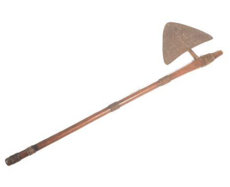 An early 20th Century Southern African Shona / Zulu People tribal axe. Flattened crescent shaped blade mounted on a wooden sh