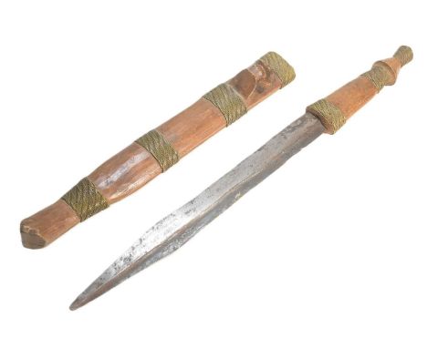 A South African ( Zimbabwe ) Shona People Bakatwa dagger. Fluted hardwood grip with fine wire banding and a long stiletto bla