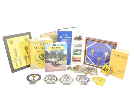 Automobilia - a collection of The AA Automobile Association books, car badge mascots and member keys. Books comprising The St