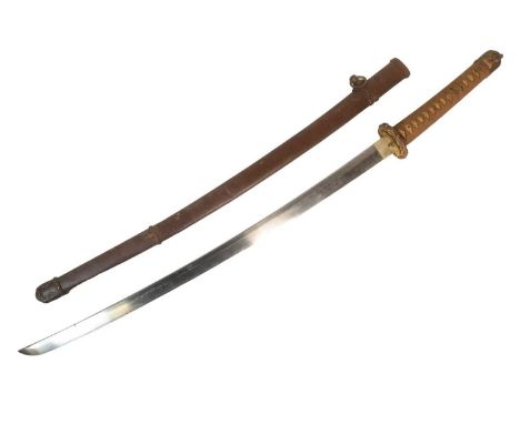 A WWII Second World War Japanese Shin Gunto / Katana Military Officers sword with signed tang. Wooden hilt bound with shark s