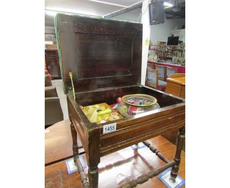 A sewing stool and contents