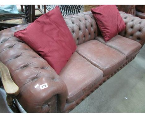 A leather Chesterfield sofa