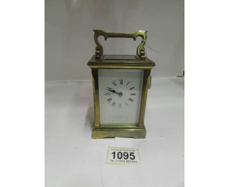 A brass carriage clock