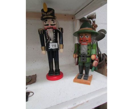 2 nut cracker figures of a soldier and a gamekeeper/poacher