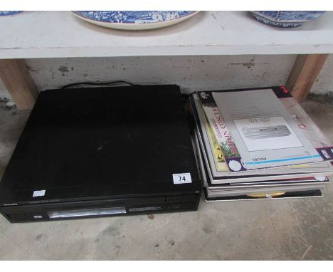 A Phillip's video recorder and quantity of records