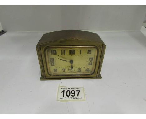 A French brass travelling clock