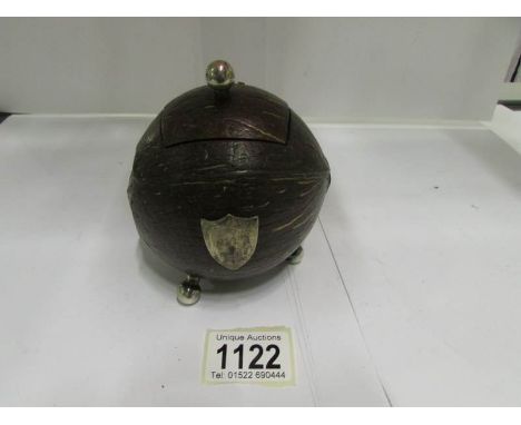 A coconut tea caddy with silver plated fittings