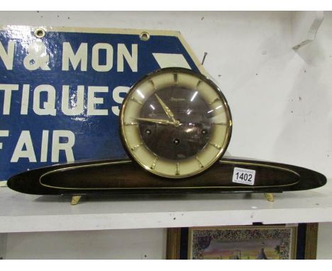 A Art Deco Westminster chime mantel clock by Dugena with Hermle movement