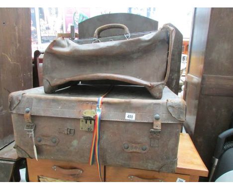A leather trunk and a large leather Gladstone bag