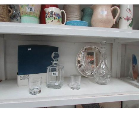 A decanter and 2 glasses set, another decanter and a silver plated tray