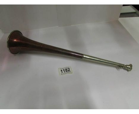 A copper and white metal hunting horn by Henry Keat & Sons, London