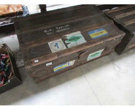 A steamer trunk with labels
