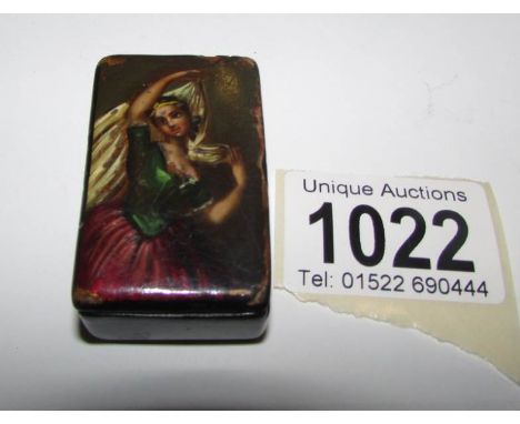 A papier mache snuff box with painted lady