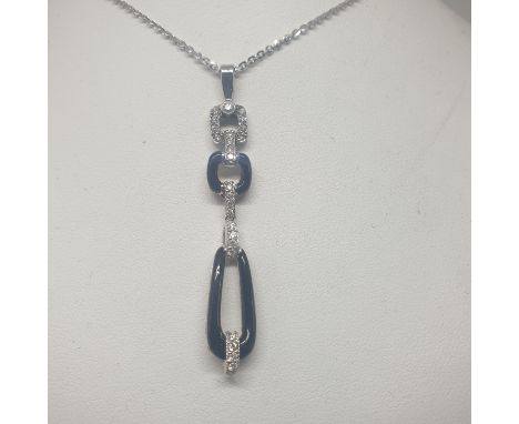 18 KT GOLD CHAIN WITH 18 KT GOLD PENDANT, BLUE ENAMEL AND ROUND OF ROUND DIAMONDS FOR ABOUT 0.25 CT G/VVS. LENGTH 44 GR. 6.2 